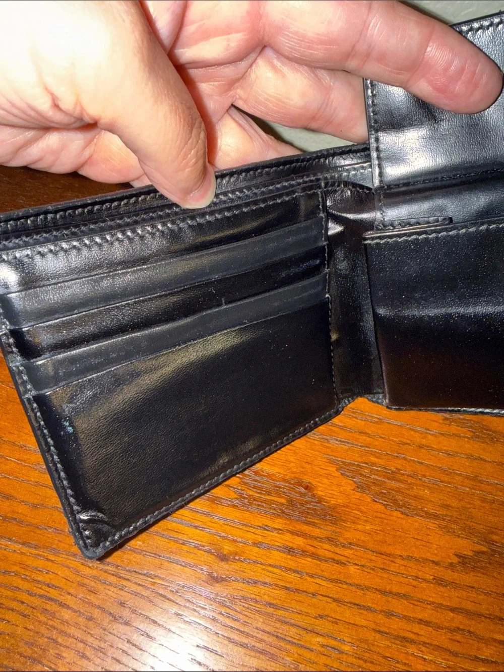 Yves Saint Laurent Black Leather Bifold wallet with Silver YSL Logo-